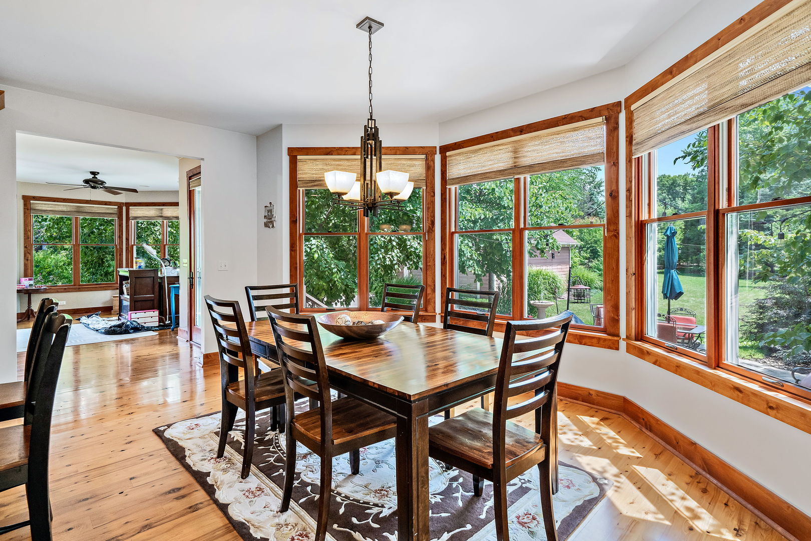4511 Cumnor Road Downers Grove, IL 60515 - Photo 13 of 42 a dining room with furniture window wooden floor