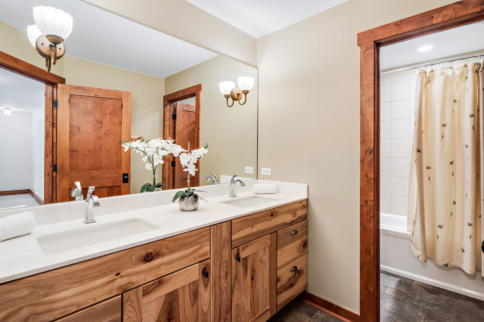 4511 Cumnor Road Downers Grove, IL 60515 - Photo 26 of 42 a bathroom with a double vanity sink and a mirror