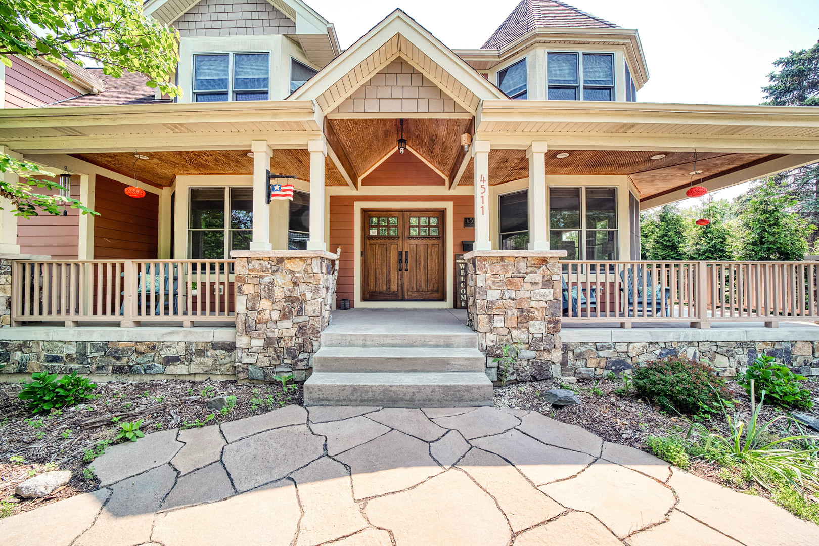 4511 Cumnor Road Downers Grove, IL 60515 - Photo 3 of 42 a front view of a house with a garden