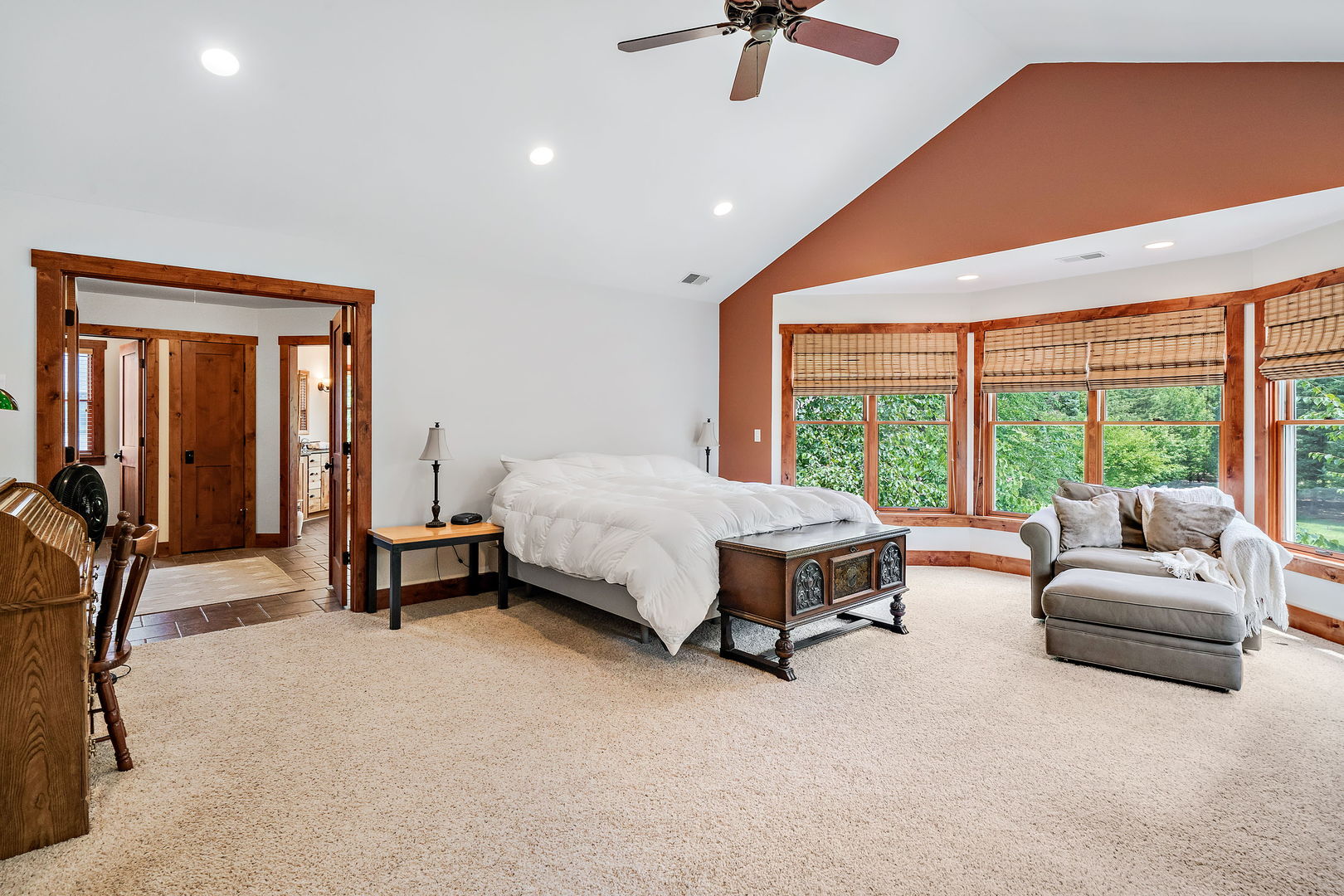 4511 Cumnor Road Downers Grove, IL 60515 - Photo 33 of 42 a spacious bedroom with a bed and a couch