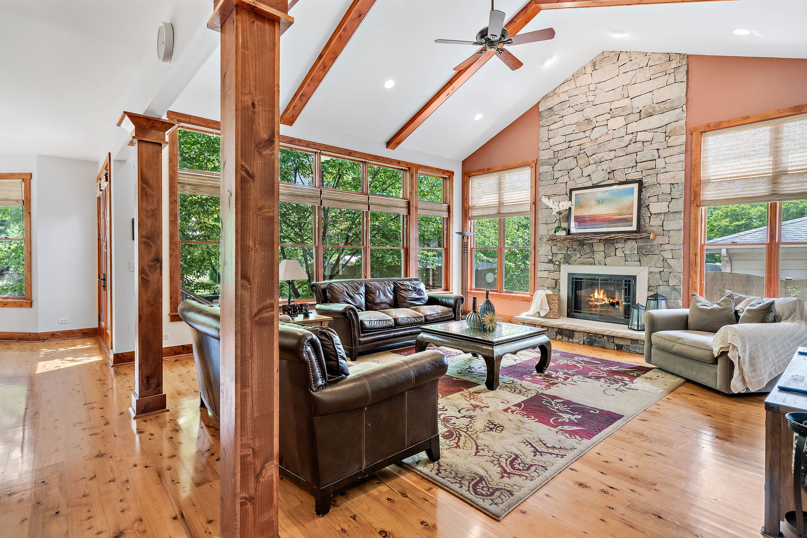 4511 Cumnor Road Downers Grove, IL 60515 - Photo 6 of 42 a living room with furniture large window and a fireplace