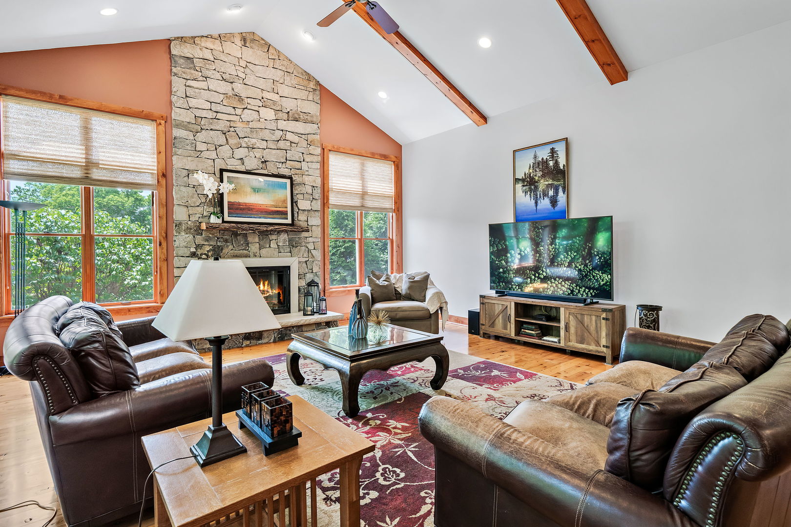 4511 Cumnor Road Downers Grove, IL 60515 - Photo 7 of 42 a living room with furniture a flat screen tv and a large window