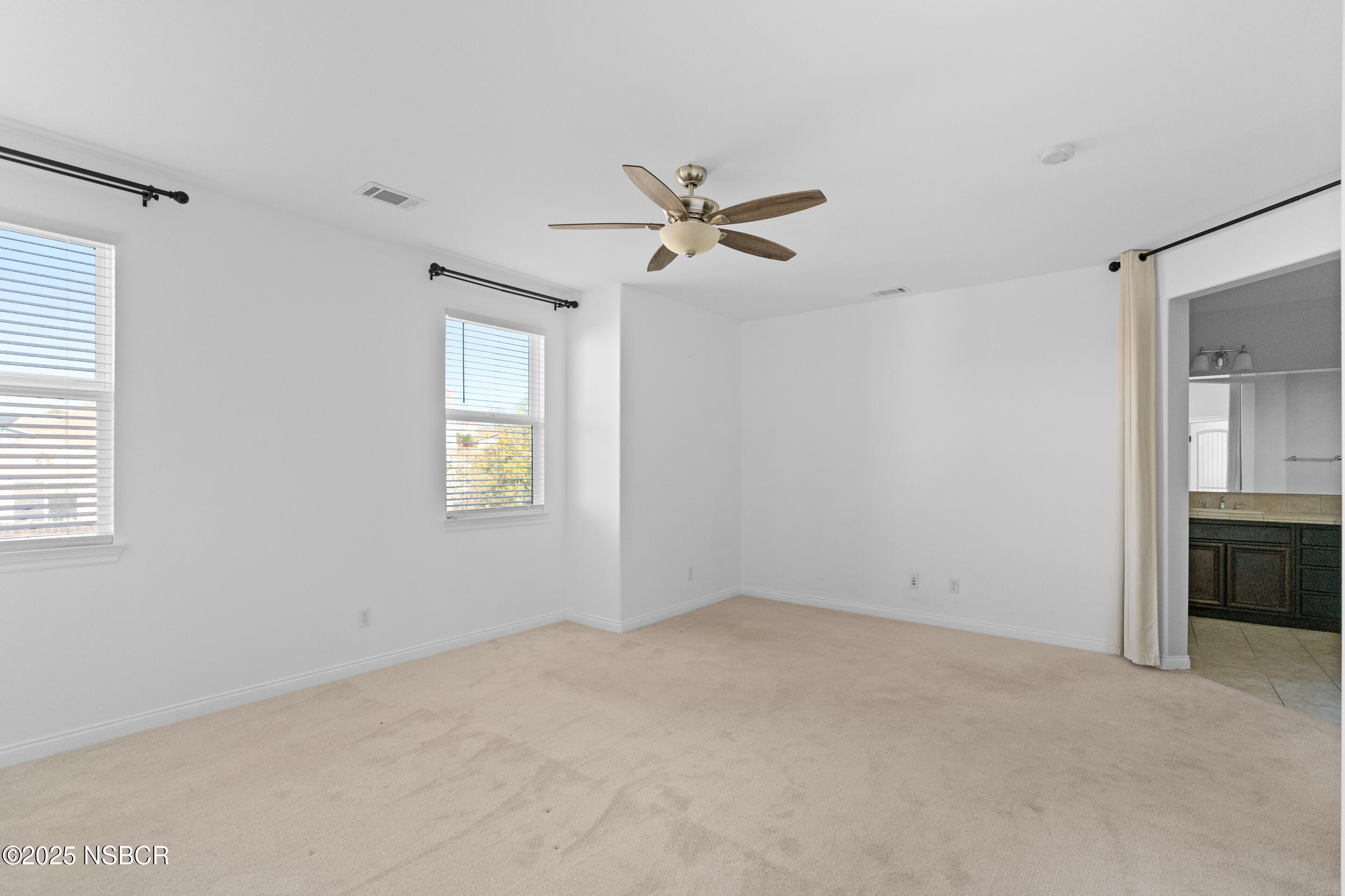608 Celestial Way Lompoc, CA 93436 - Photo 27 of 40 a view of room with a ceiling fan and a window