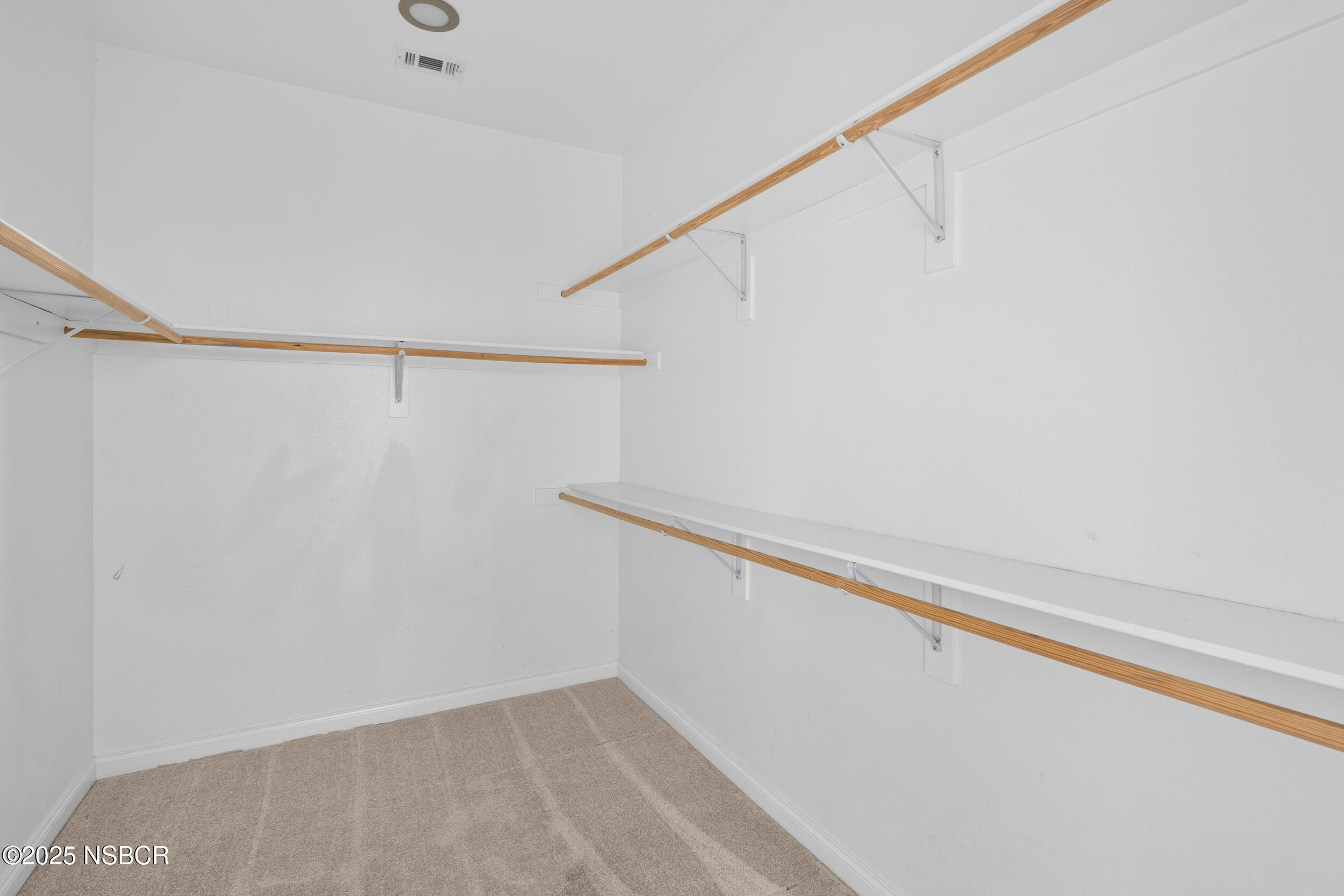 608 Celestial Way Lompoc, CA 93436 - Photo 34 of 40 a view of small space with racks on the wall