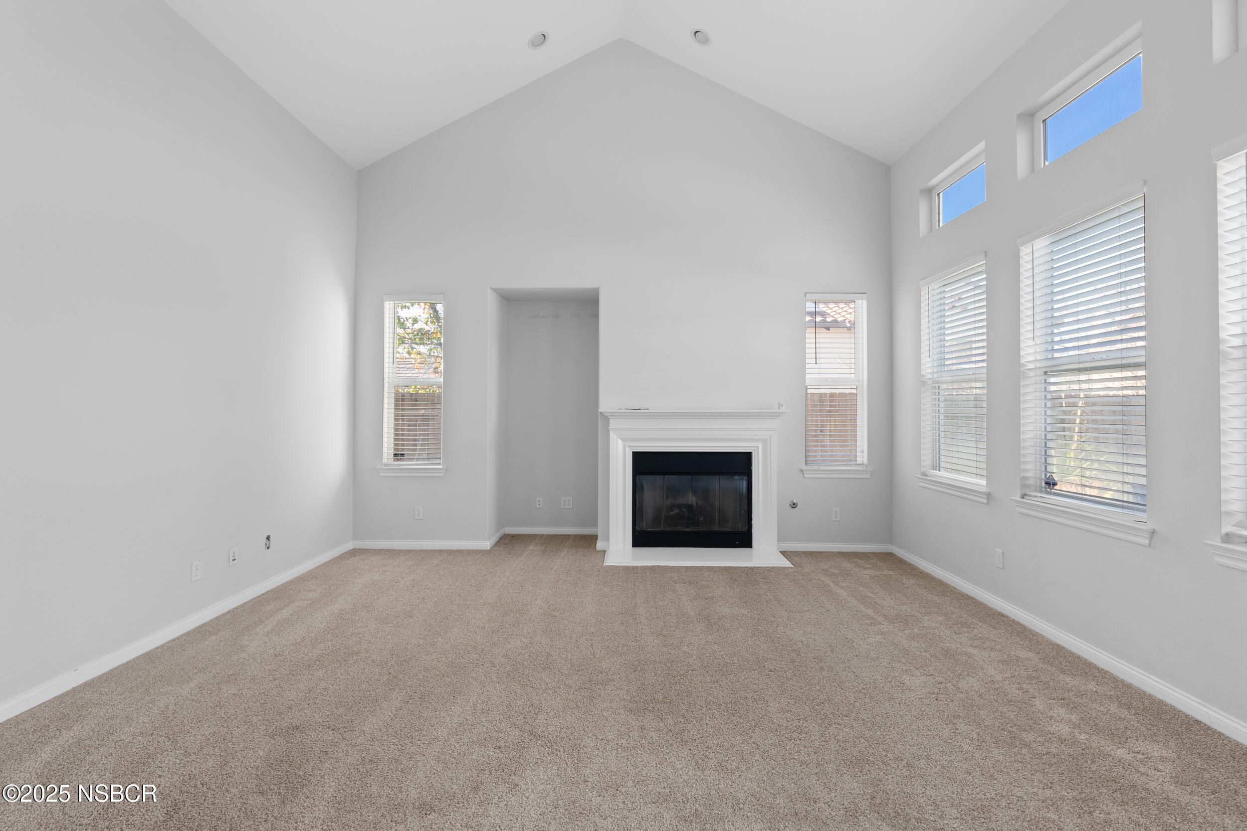 608 Celestial Way Lompoc, CA 93436 - Photo 8 of 40 a view of empty room with a fireplace