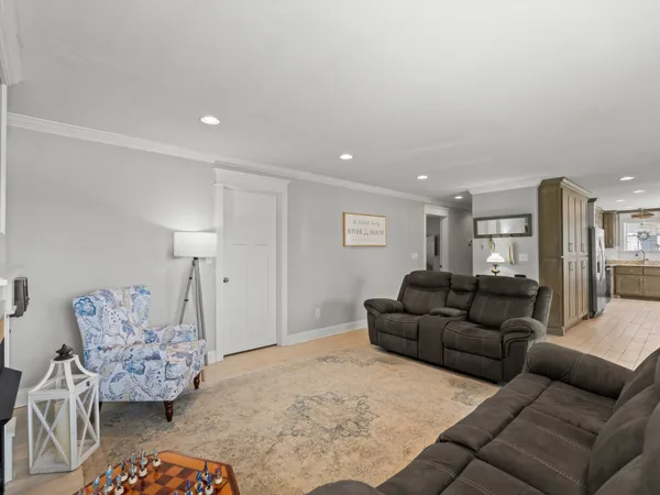 a living room with furniture and a couch