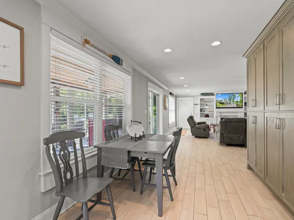 a view of a dining room with furniture window and outside view