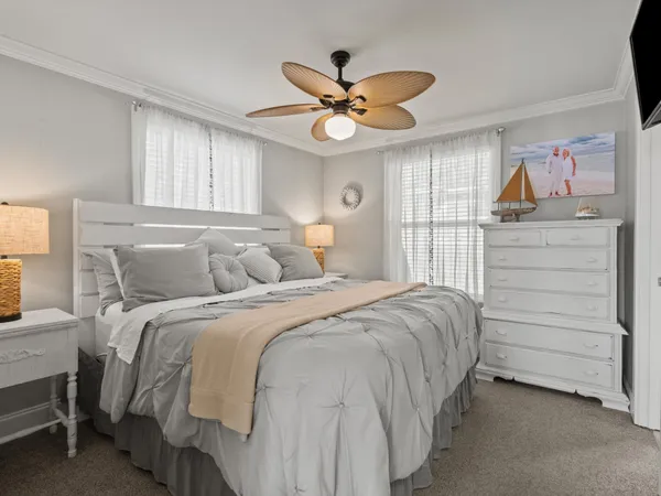 a bedroom with a bed and window