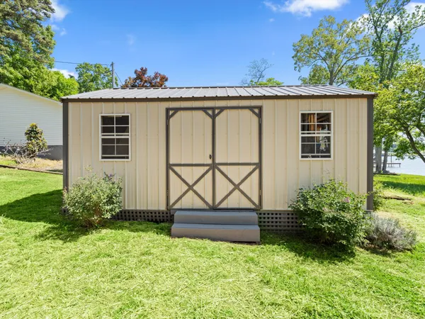 a view of a house with a garden