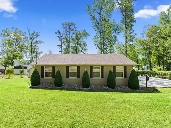 a view of a house with a garden