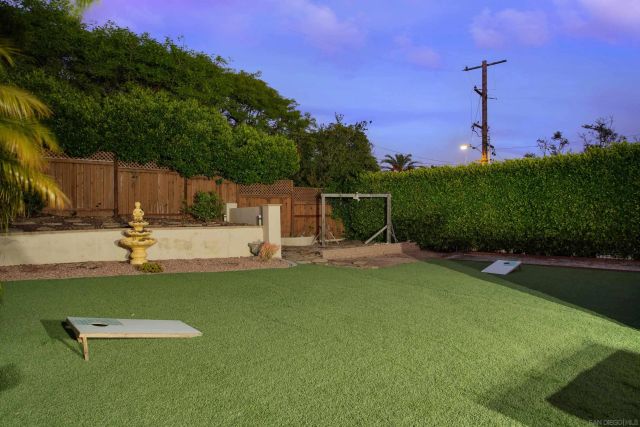 a view of a garden with a slide