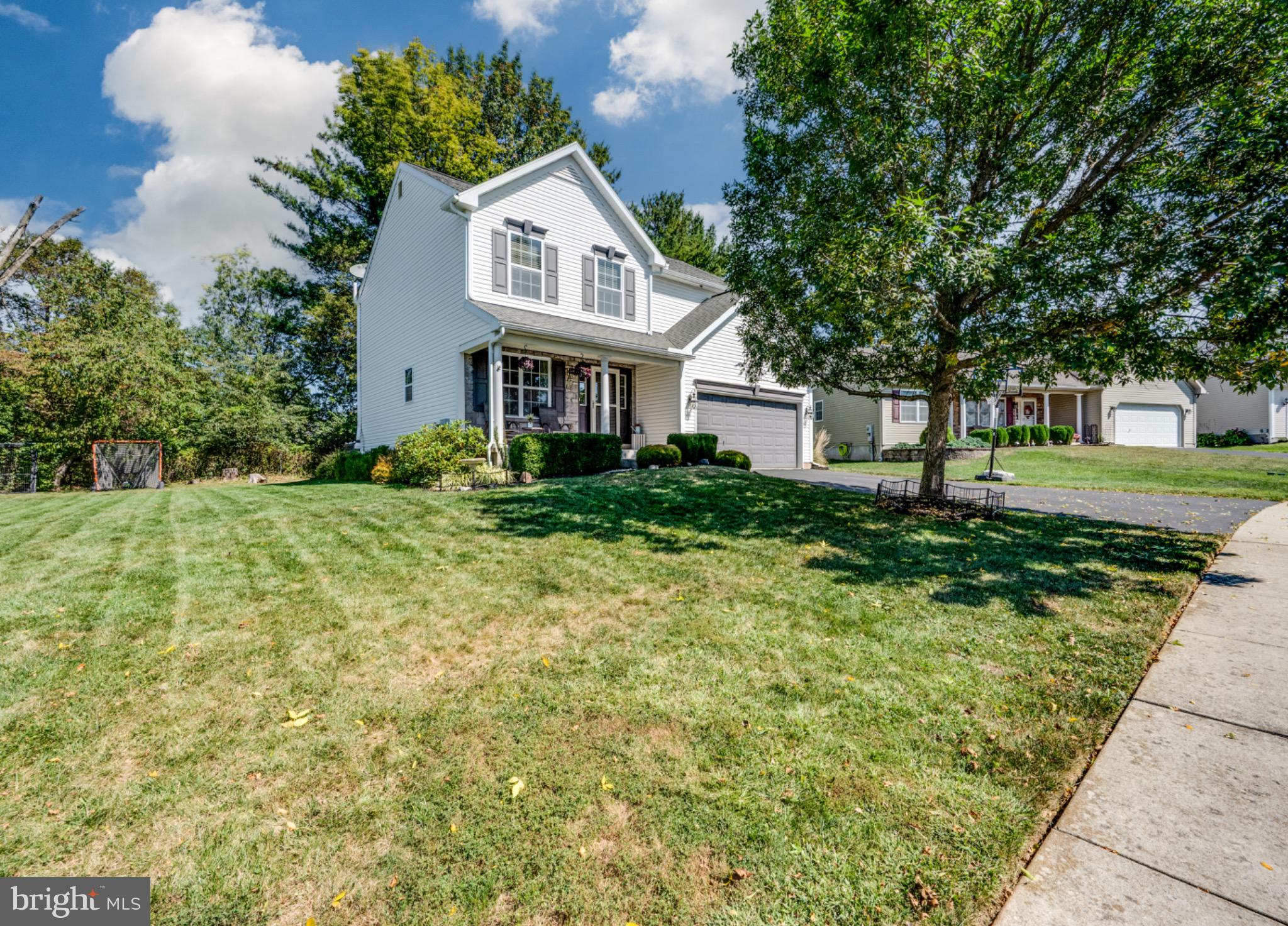 43 Thayer Road Birdsboro, PA 19508 - Photo 3 of 47 Charming home with lush green surroundings.