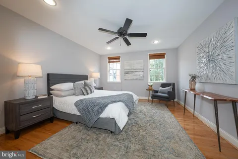 a bed room with a bed and a window