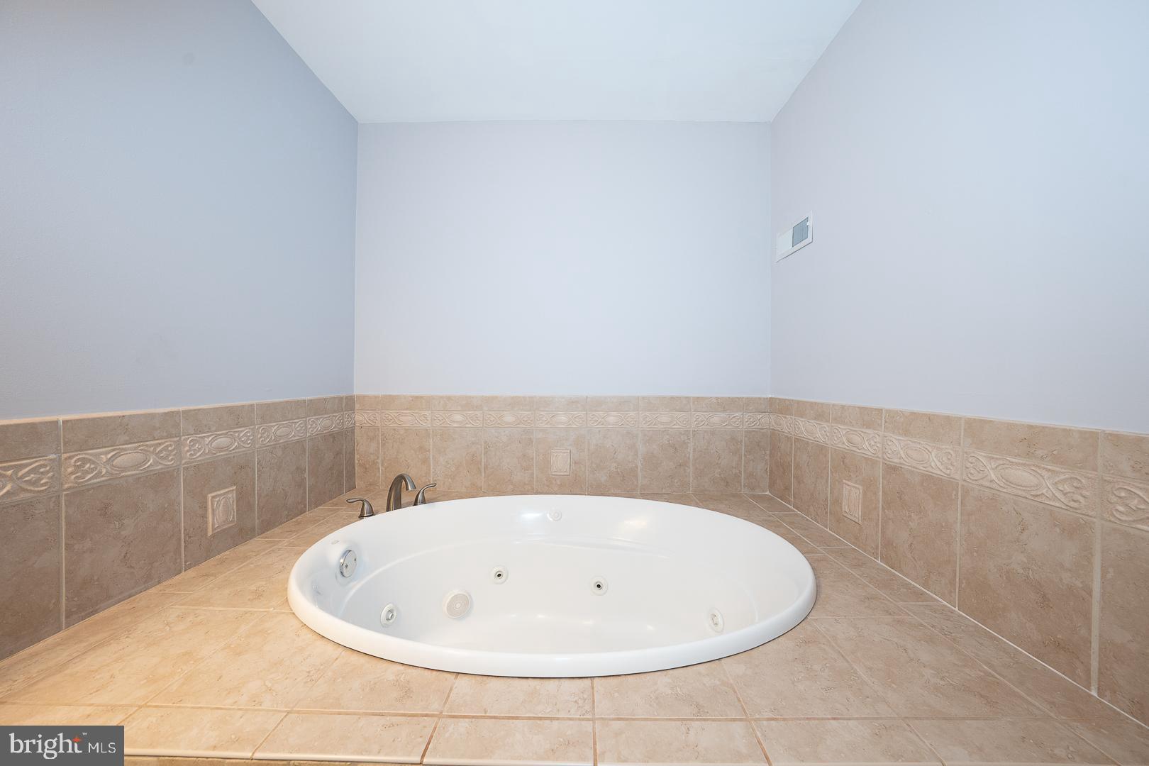 2406 Catharine Street Philadelphia, PA 19146 - Photo 16 of 37 a bathroom with a bathtub and shower