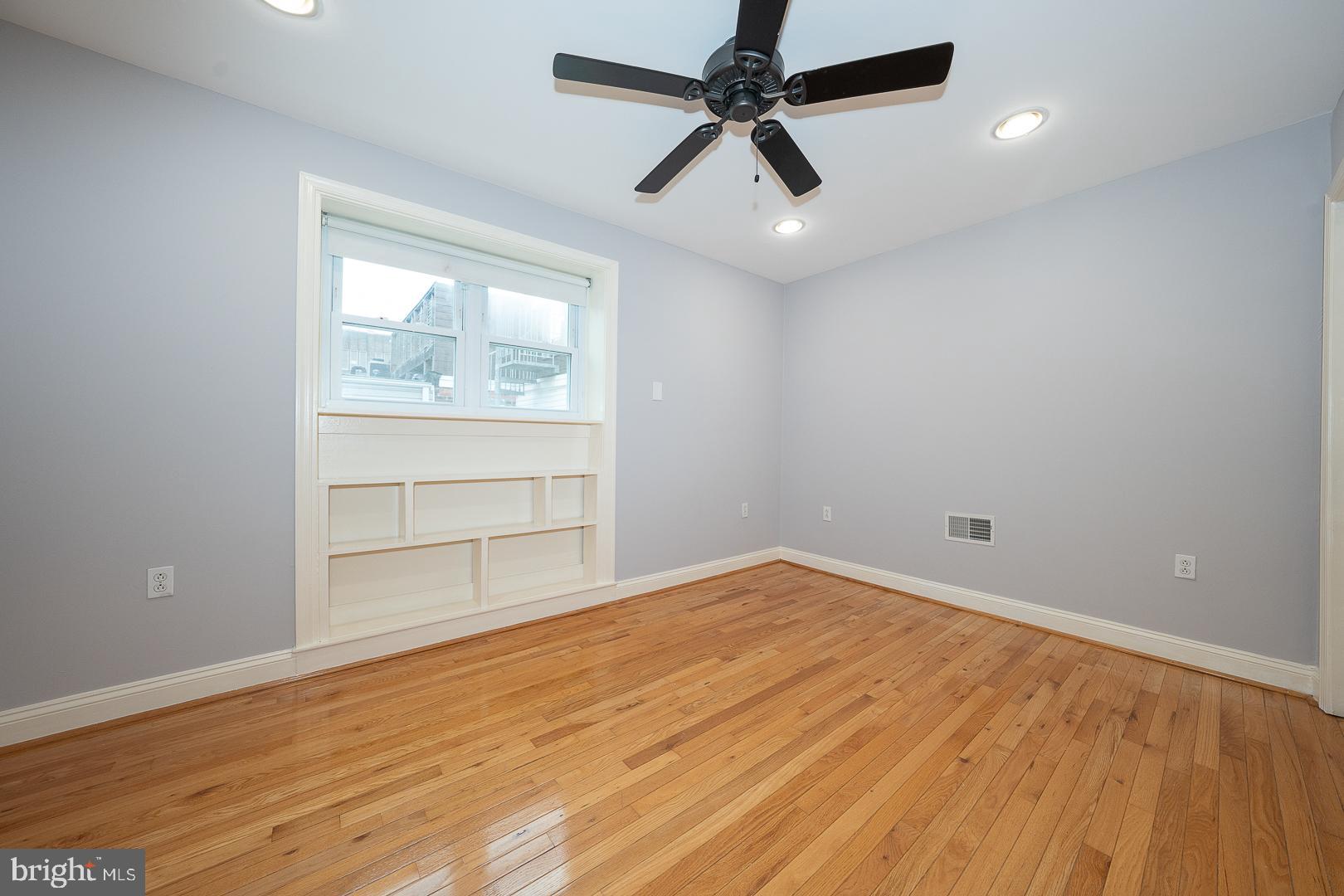 2406 Catharine Street Philadelphia, PA 19146 - Photo 22 of 37 an empty room with a empty space and windows