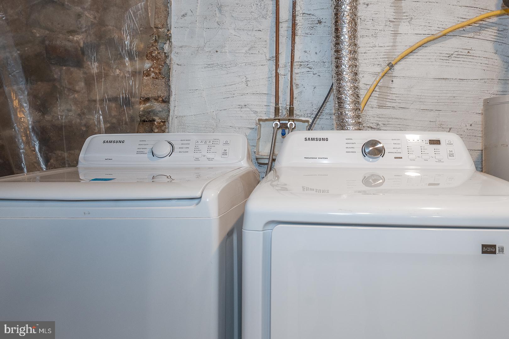2406 Catharine Street Philadelphia, PA 19146 - Photo 28 of 37 a utility room with dryer and washer