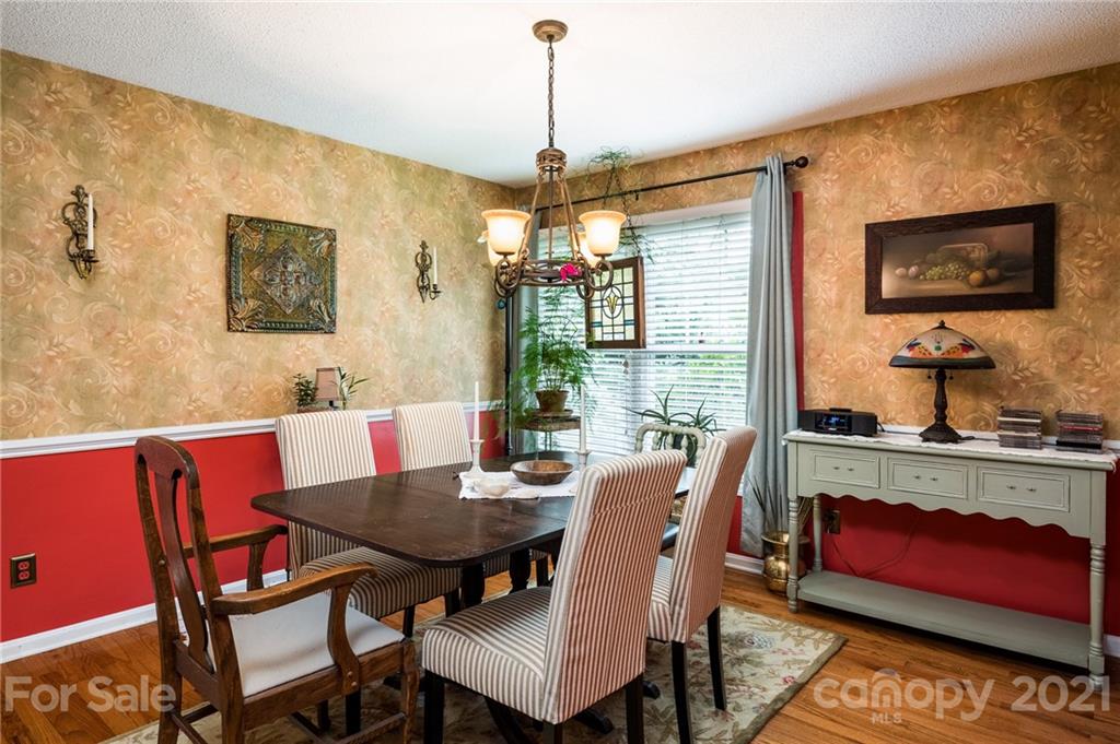 10900 Flat Iron Road Charlotte, NC 28226 - Photo 20 of 44 a view of a dining room with furniture window and outside view