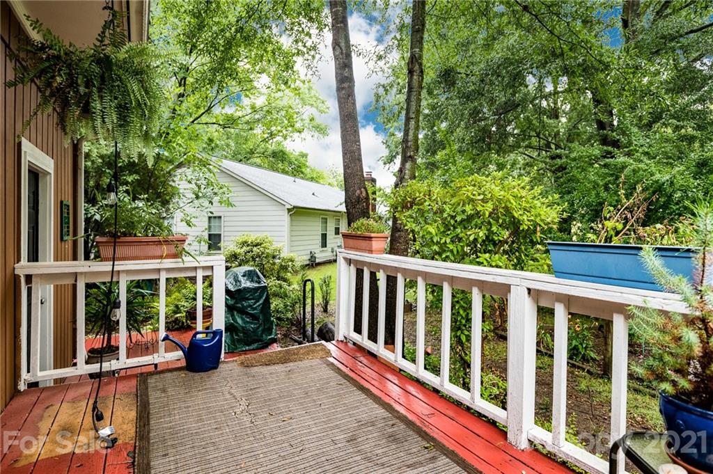 10900 Flat Iron Road Charlotte, NC 28226 - Photo 34 of 44 a view of a two chairs in the deck next to a yard