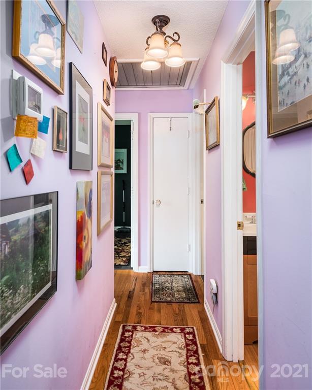 10900 Flat Iron Road Charlotte, NC 28226 - Photo 5 of 44 a very nice looking room with many windows