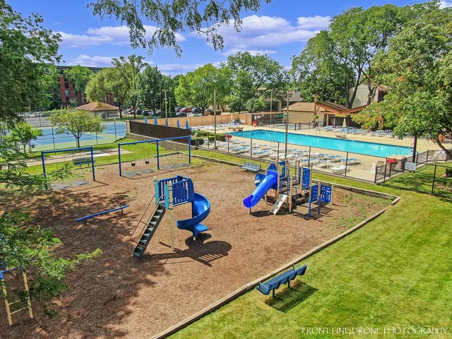 a sign on the side of the tree