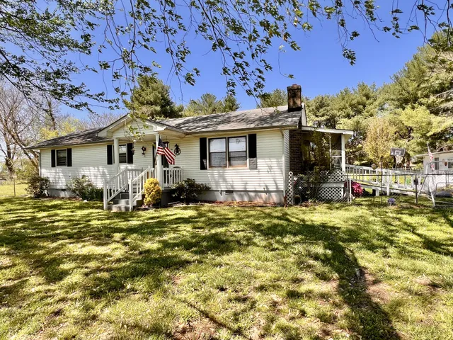 a front view of a house with swimming pool