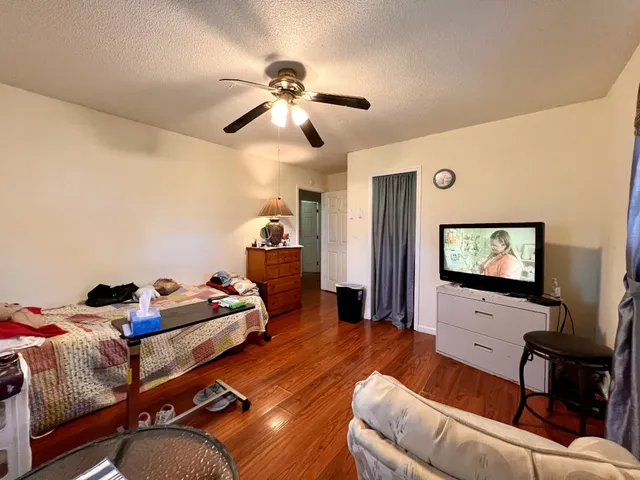 a room with wine cabinets and a table