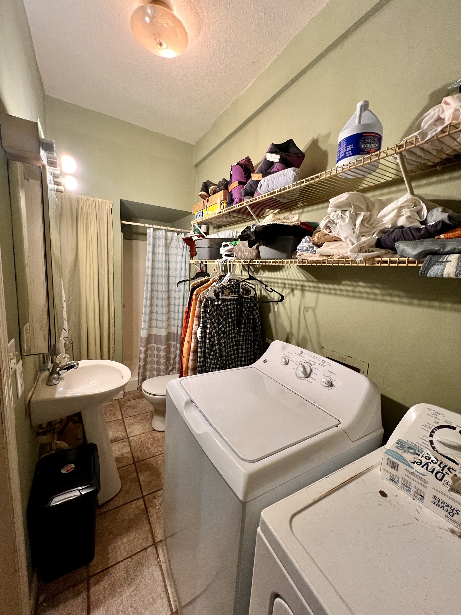 1112 Cumberland Street Decherd, TN 37324 - Photo 31 of 52 a storage room with washer and dryer