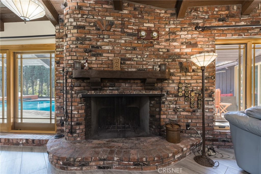 10610 Walnut Drive Shadow Hills, CA 91040 - Photo 14 of 50 a room with fireplace