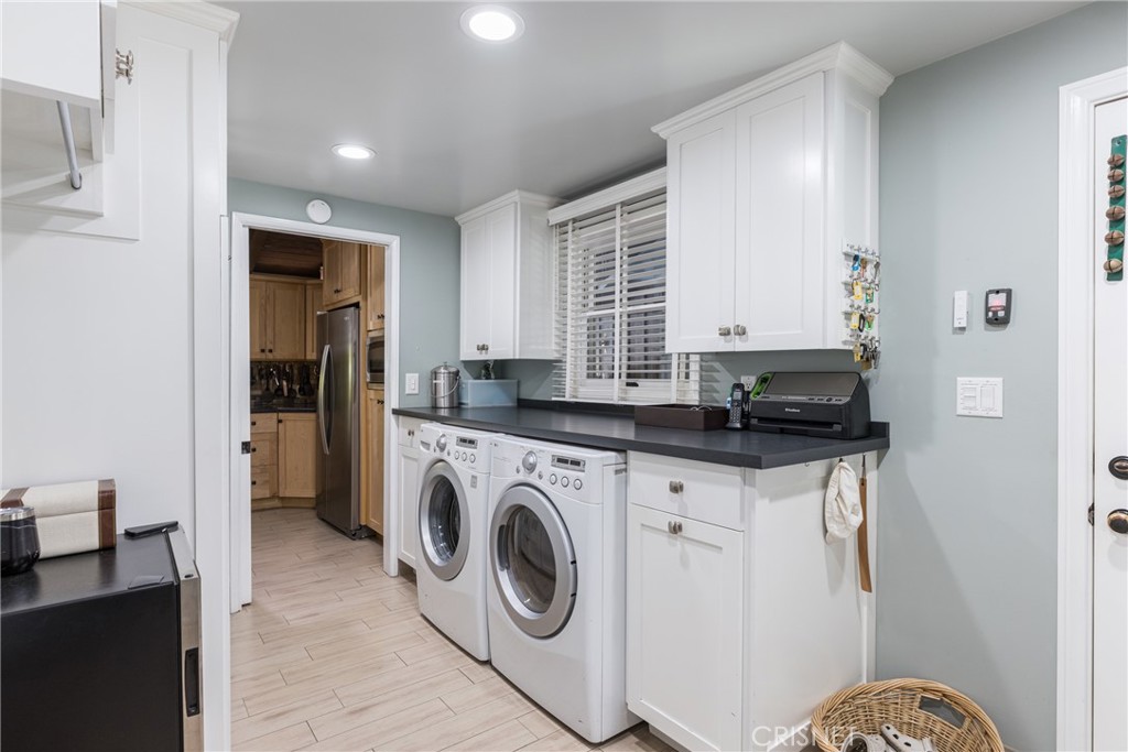 10610 Walnut Drive Shadow Hills, CA 91040 - Photo 33 of 50 a kitchen with stainless steel appliances granite countertop a refrigerator and a stove top oven