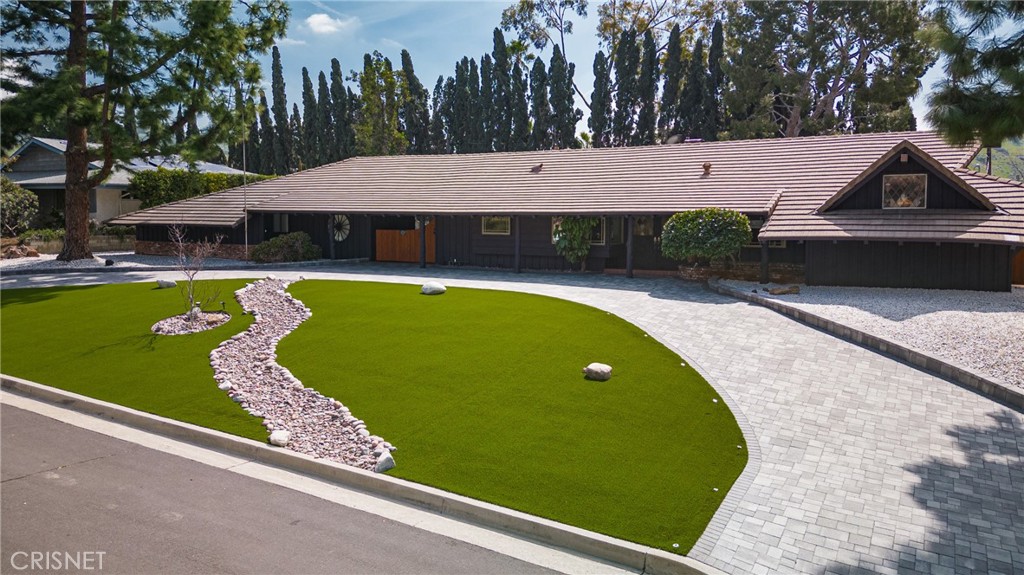 10610 Walnut Drive Shadow Hills, CA 91040 - Photo 48 of 50 a view of swimming pool with lawn chairs and plants