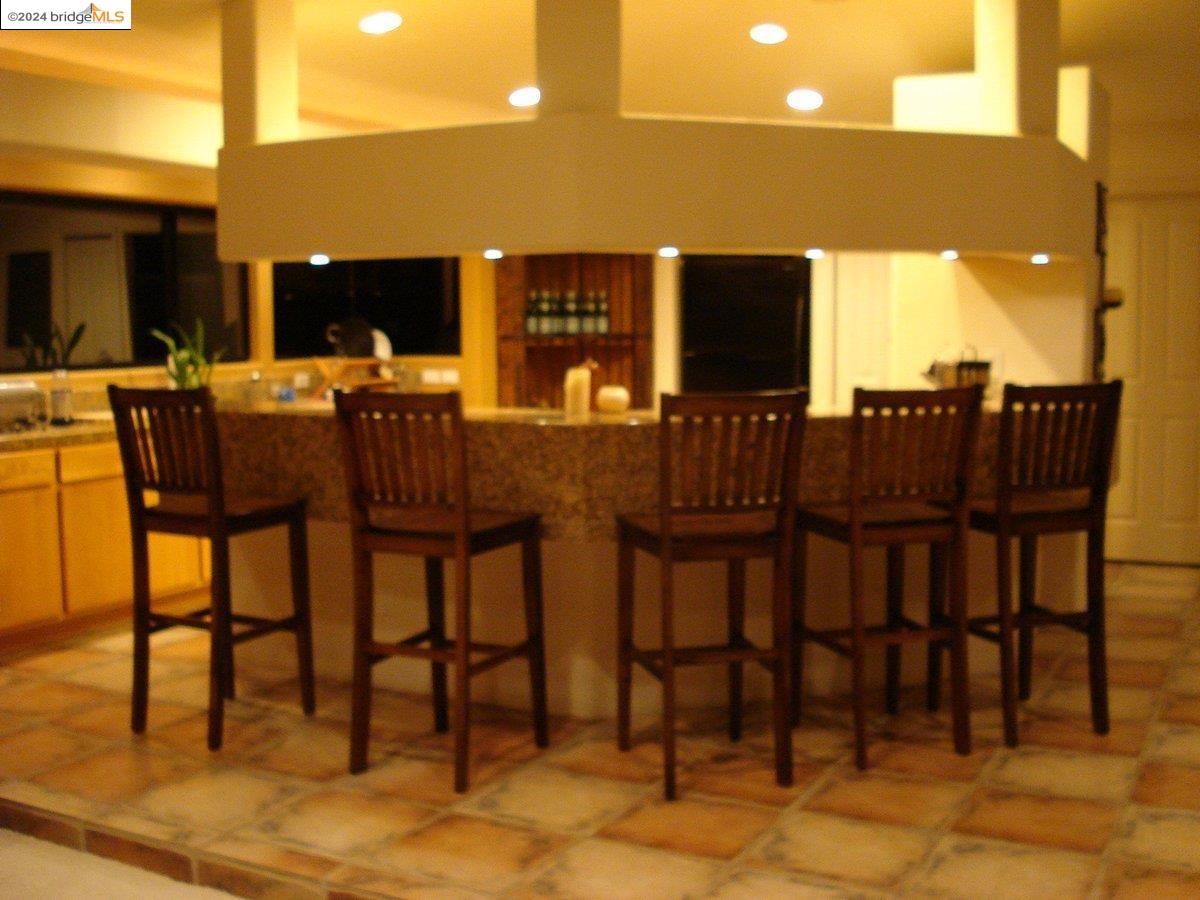 25435 Hidden Mesa Road Monterey, CA 93940 - Photo 6 of 8 a view of a dining room with furniture
