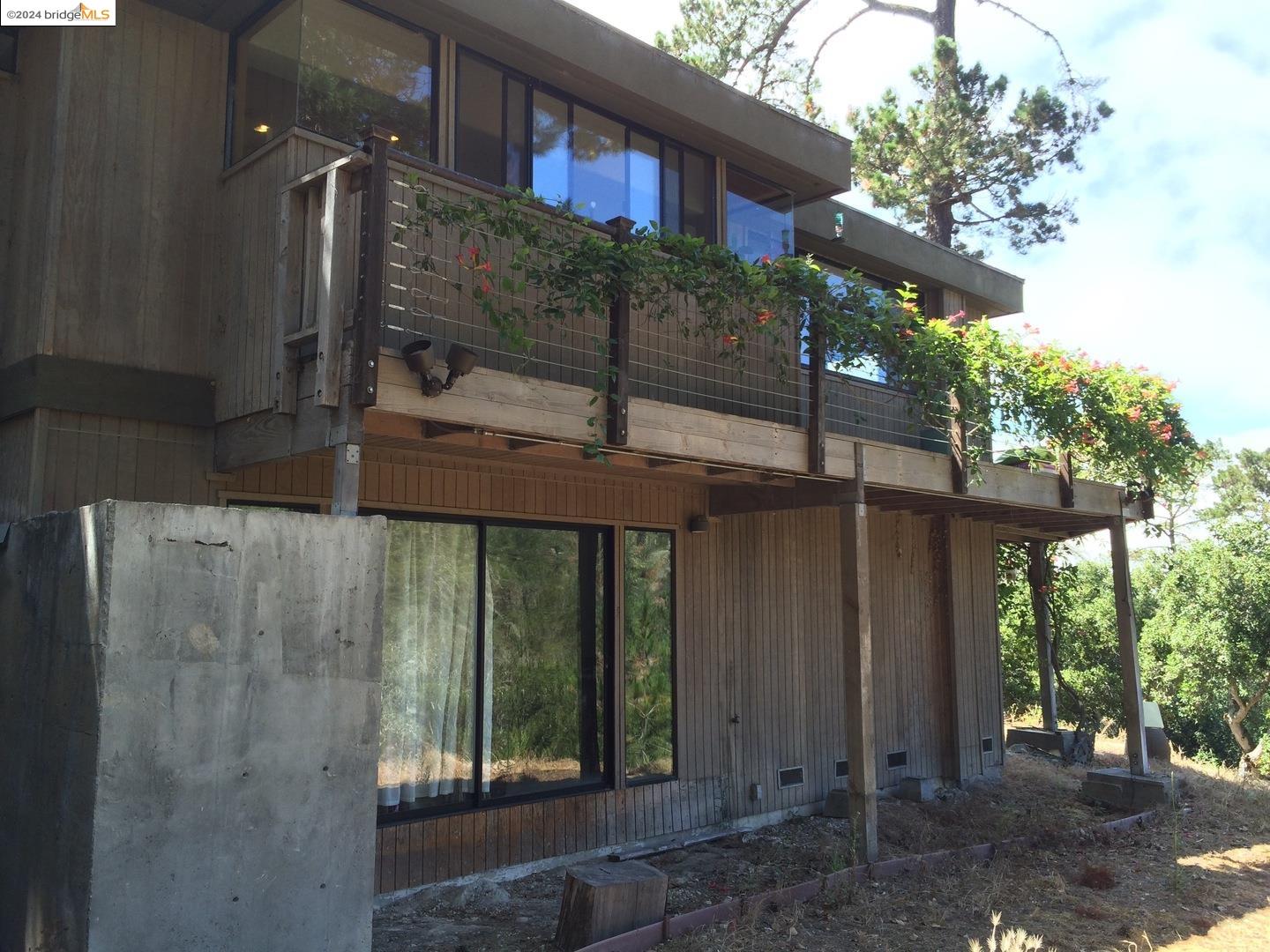 25435 Hidden Mesa Road Monterey, CA 93940 - Photo 7 of 8 a view of a entrance gate of the house