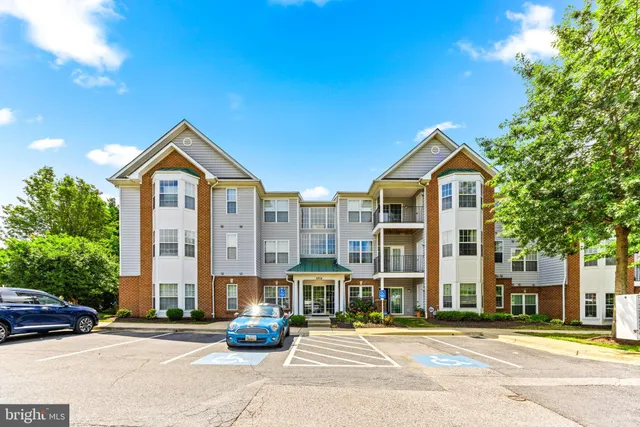 a front view of a building with street view