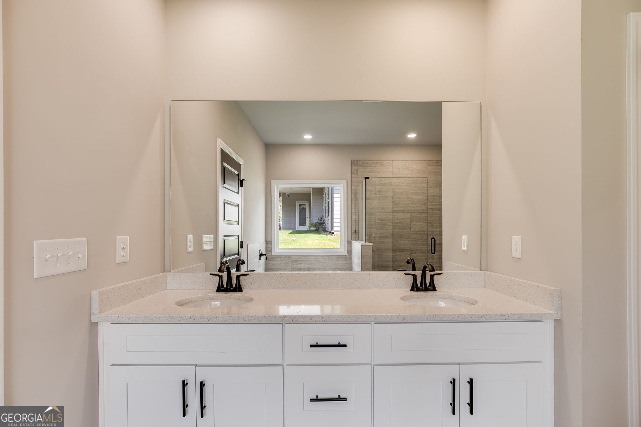 8970 Callaway Drive Winston, GA 30187 - Photo 16 of 24 a bathroom with a sink and a mirror