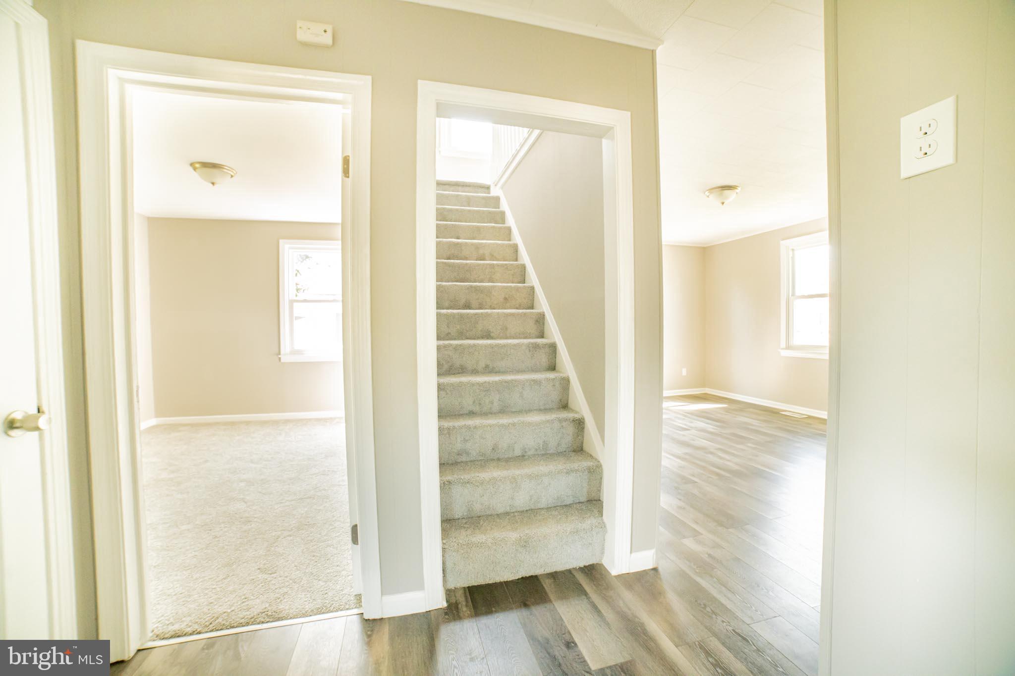 7813 New Battle Grove Road Baltimore, MD 21222 - Photo 15 of 41 Hallway to upstairs