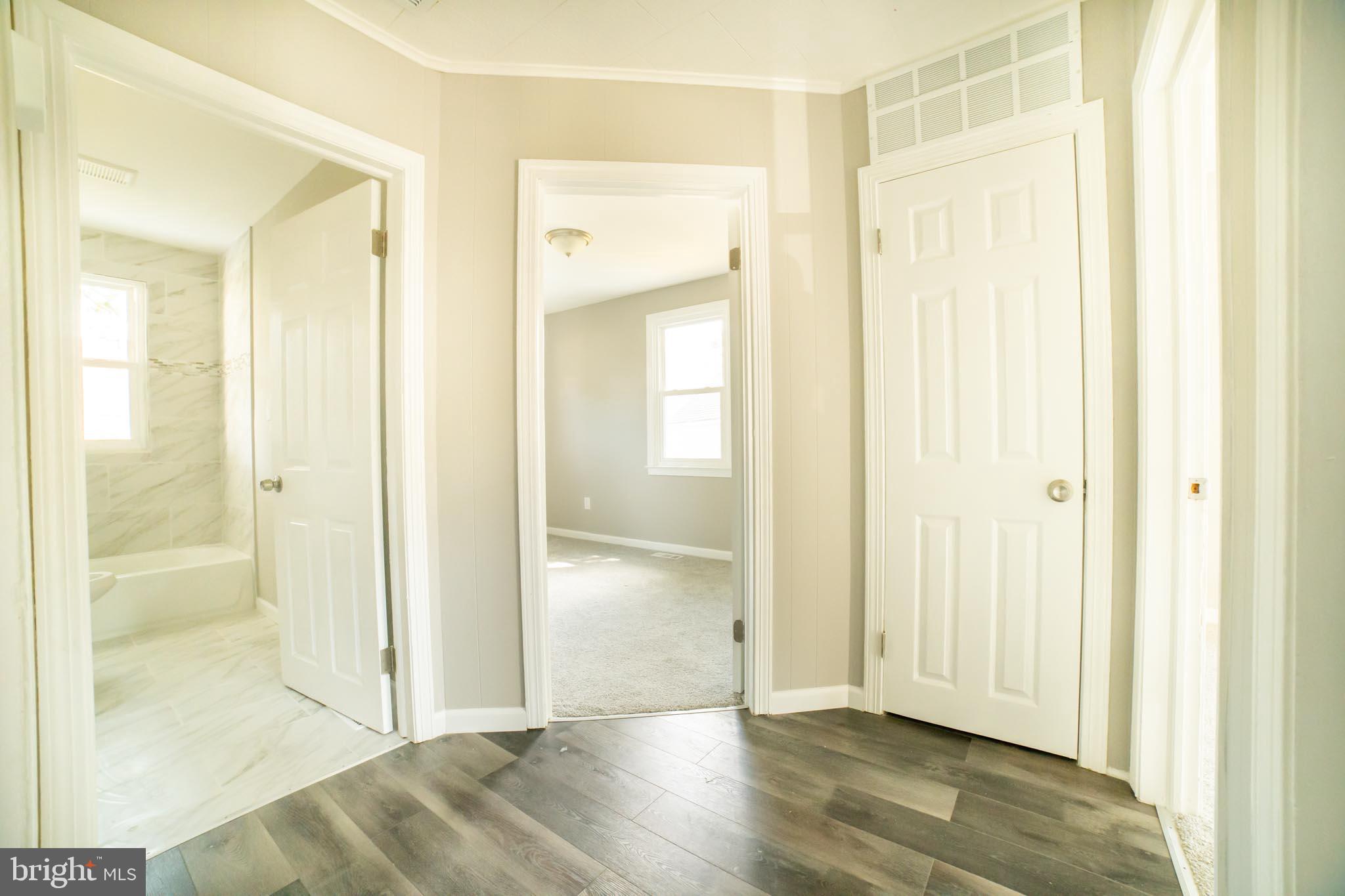 7813 New Battle Grove Road Baltimore, MD 21222 - Photo 16 of 41 Hallway to full Bath