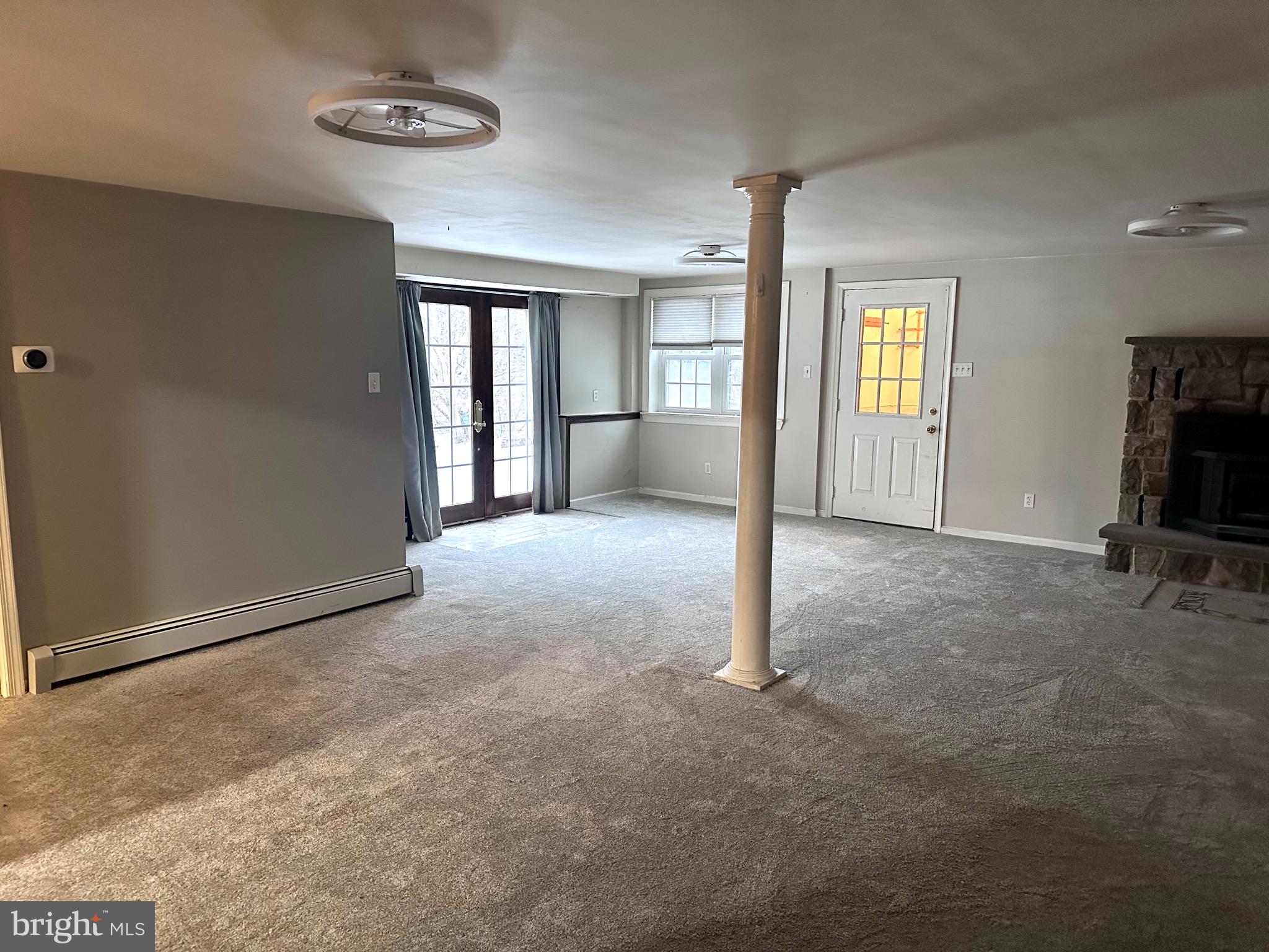 707 Dunkels Church Road Kutztown, PA 19530 - Photo 11 of 37 an empty room with windows and closet