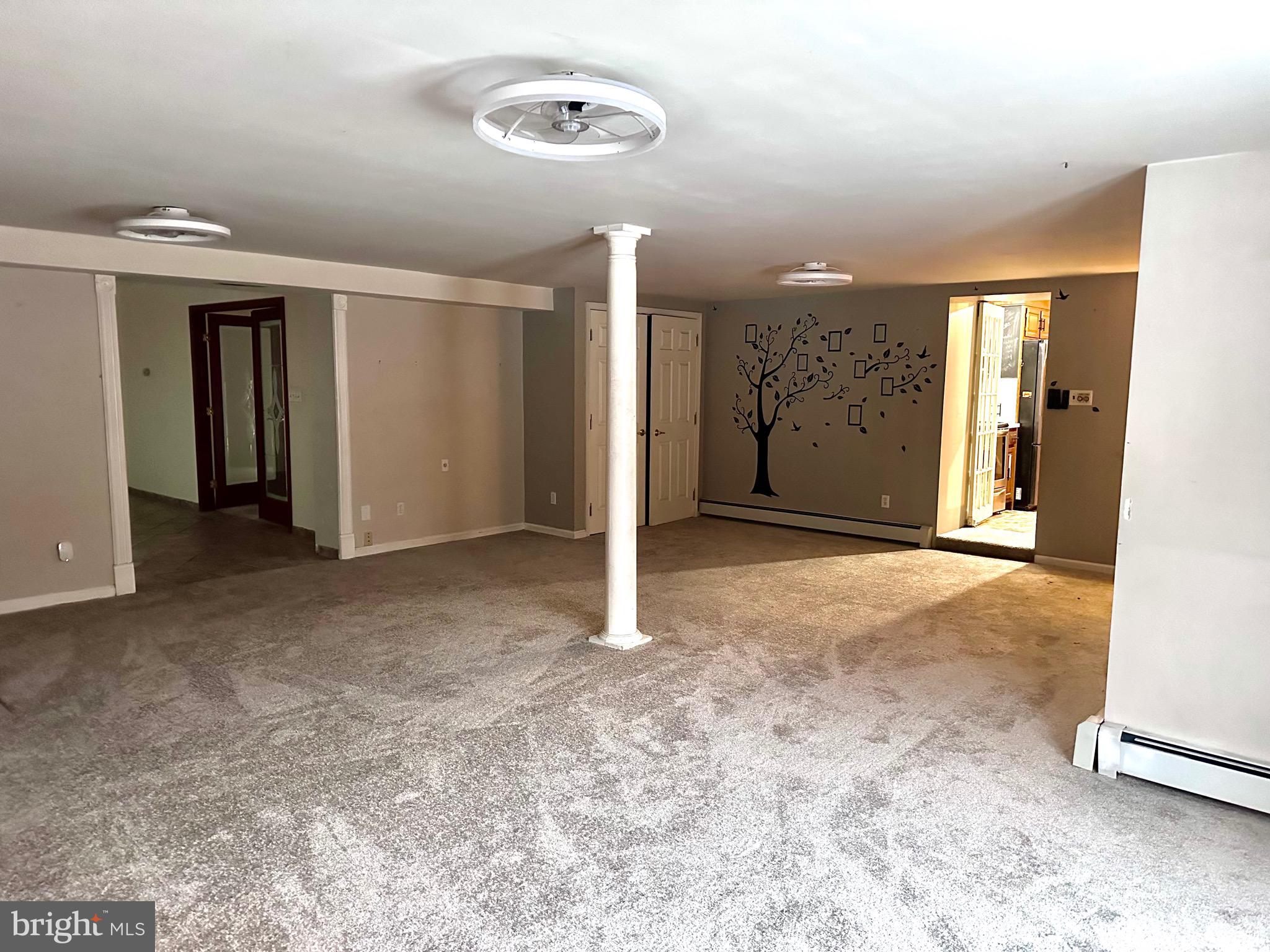 707 Dunkels Church Road Kutztown, PA 19530 - Photo 12 of 37 an empty room with closet and windows