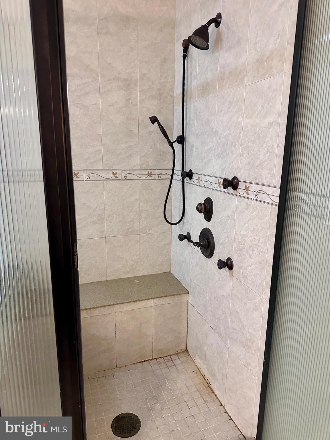 707 Dunkels Church Road Kutztown, PA 19530 - Photo 18 of 37 a bathroom with a glass shower door