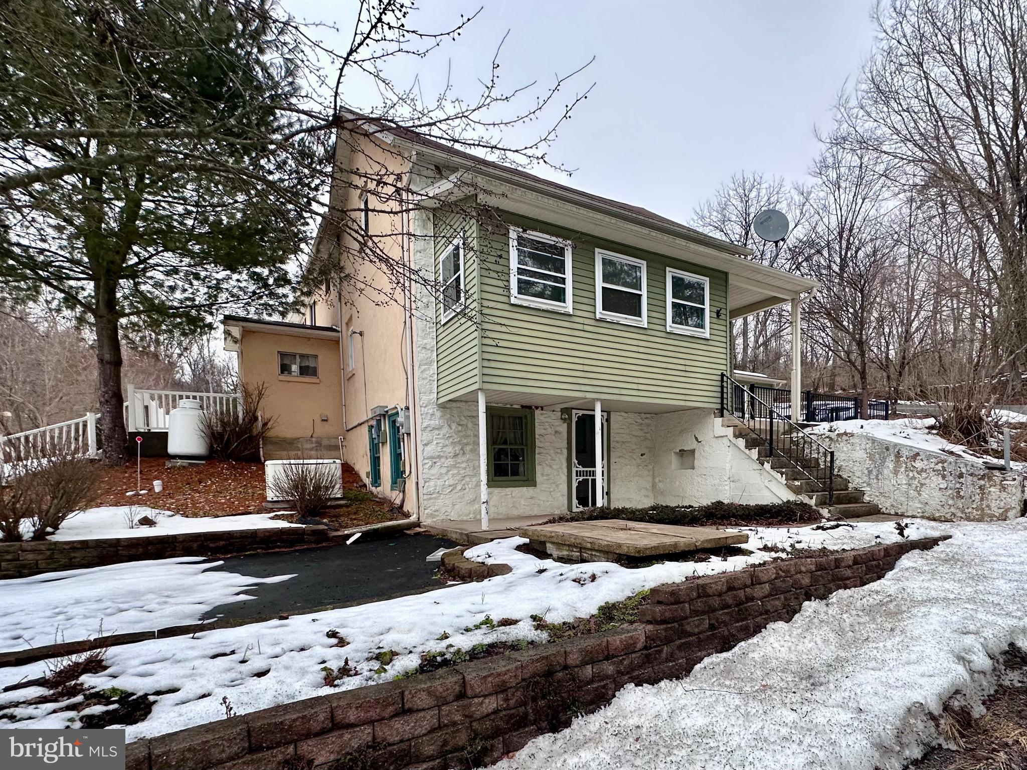 707 Dunkels Church Road Kutztown, PA 19530 - Photo 2 of 37 a view of a house with a yard covered in snow