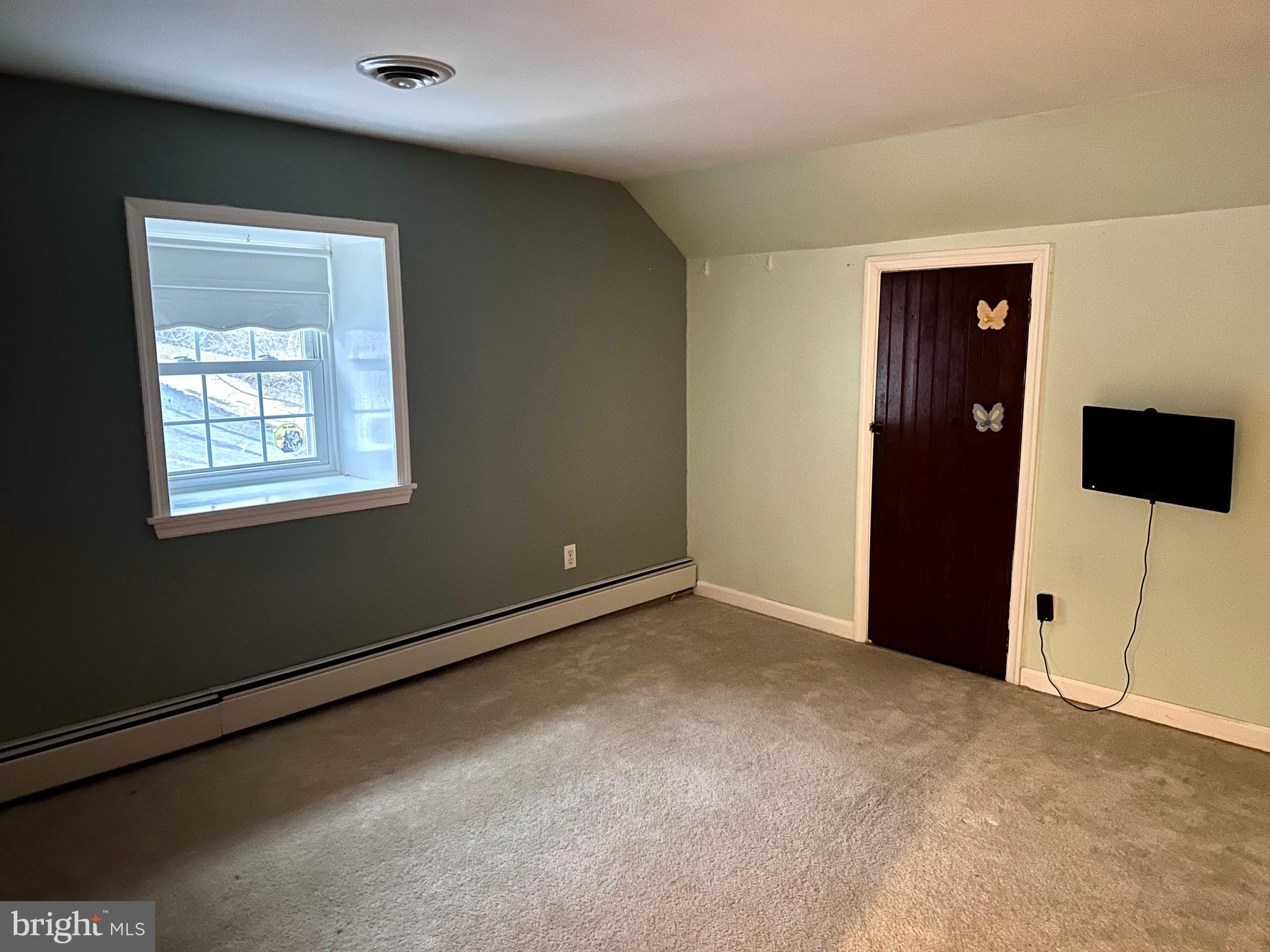 707 Dunkels Church Road Kutztown, PA 19530 - Photo 23 of 37 a view of an empty room with a window