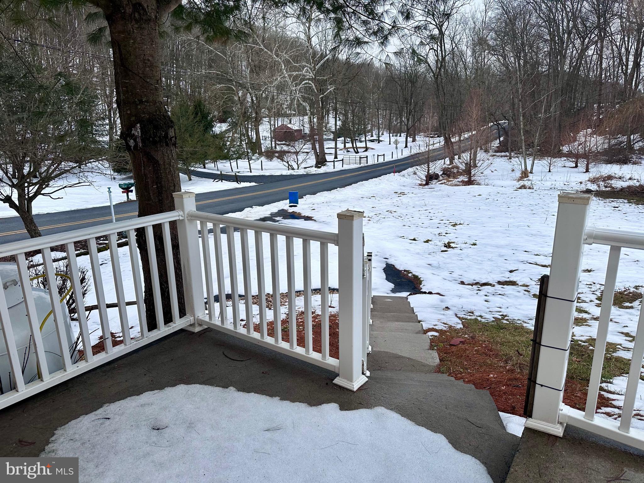 707 Dunkels Church Road Kutztown, PA 19530 - Photo 36 of 37 a view of a chair and tables in the patio