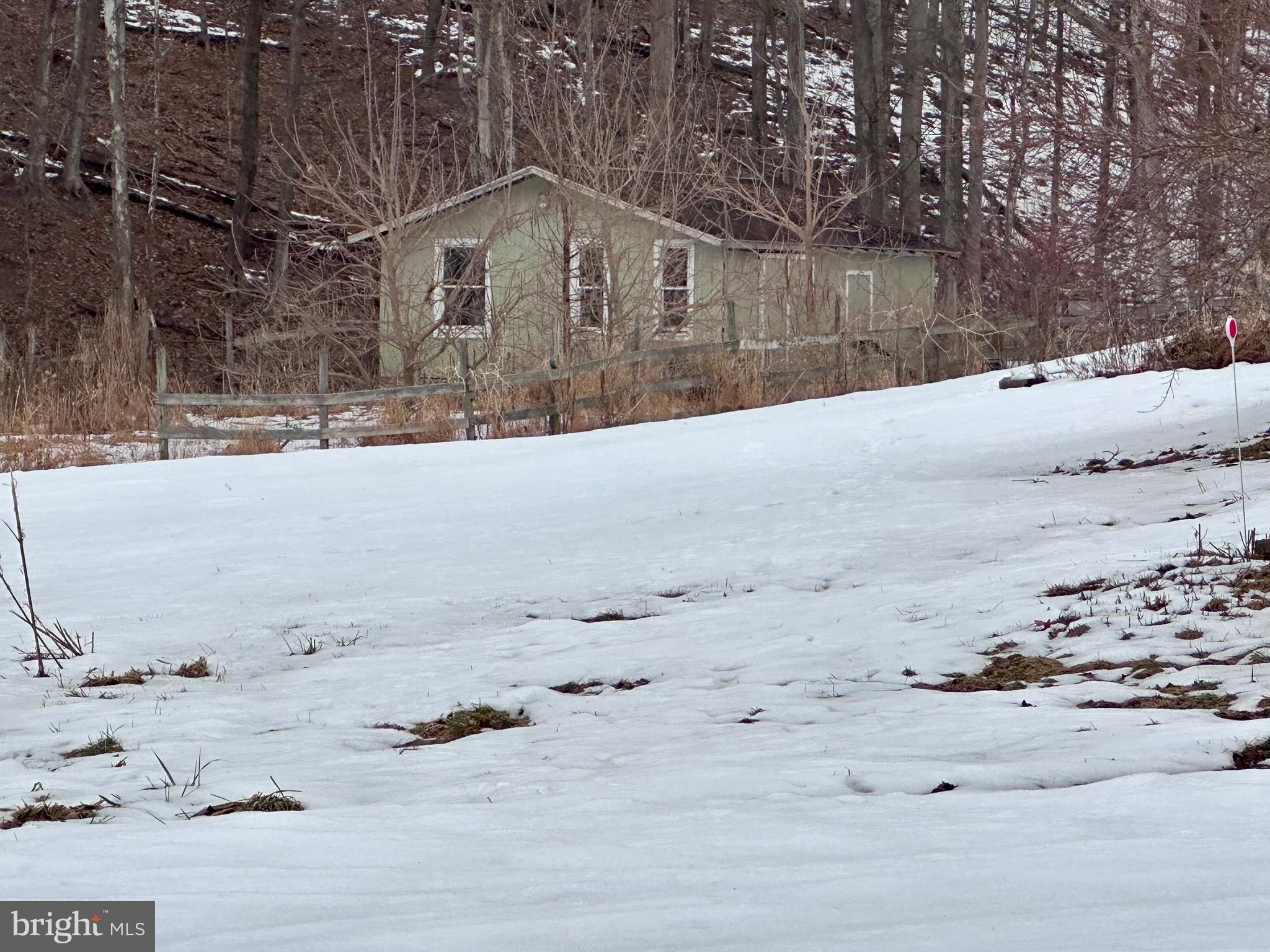 707 Dunkels Church Road Kutztown, PA 19530 - Photo 37 of 37 a view of a dry yard covered with snow in the snow
