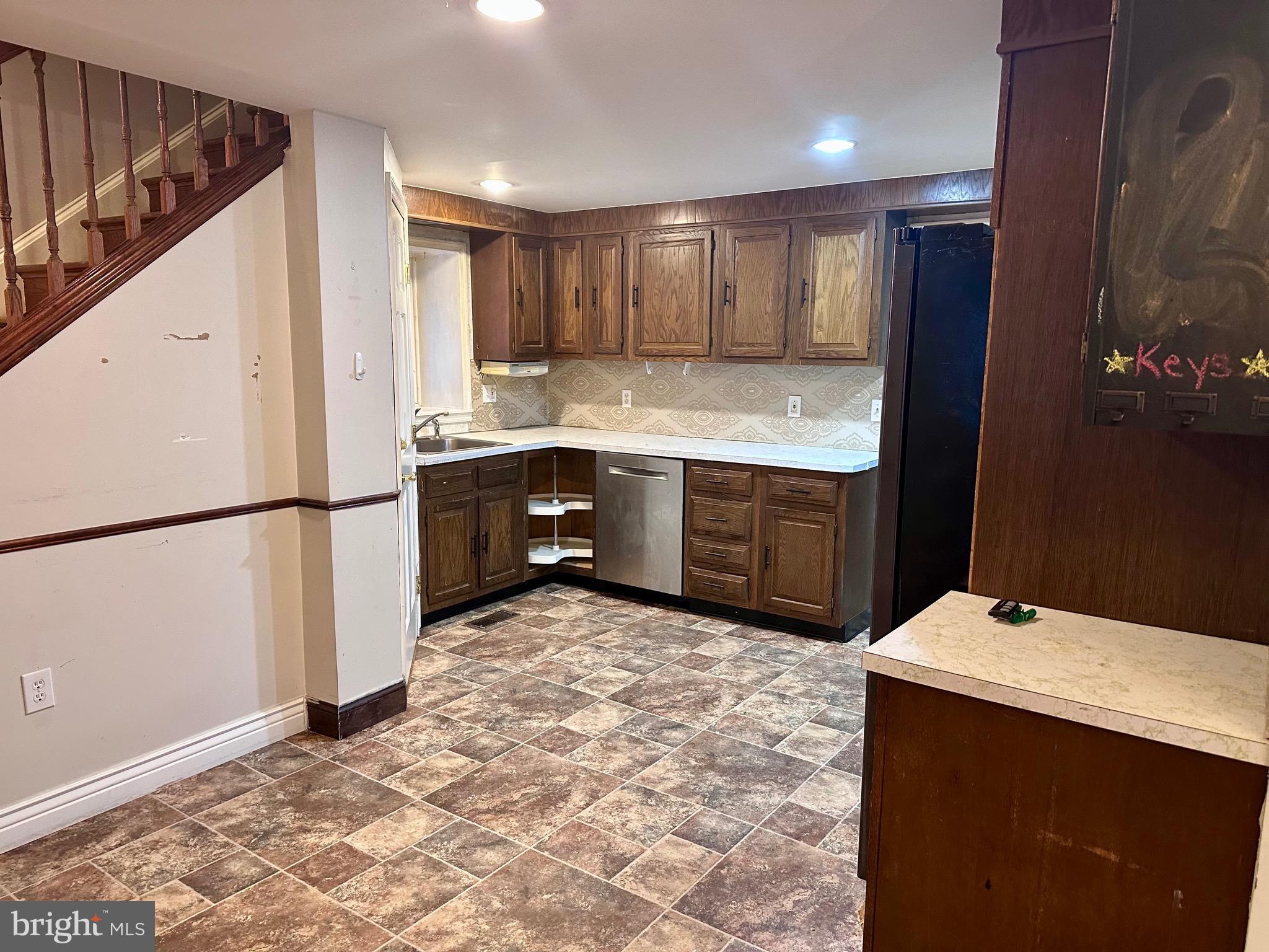 707 Dunkels Church Road Kutztown, PA 19530 - Photo 7 of 37 a kitchen with sink cabinets and refrigerator