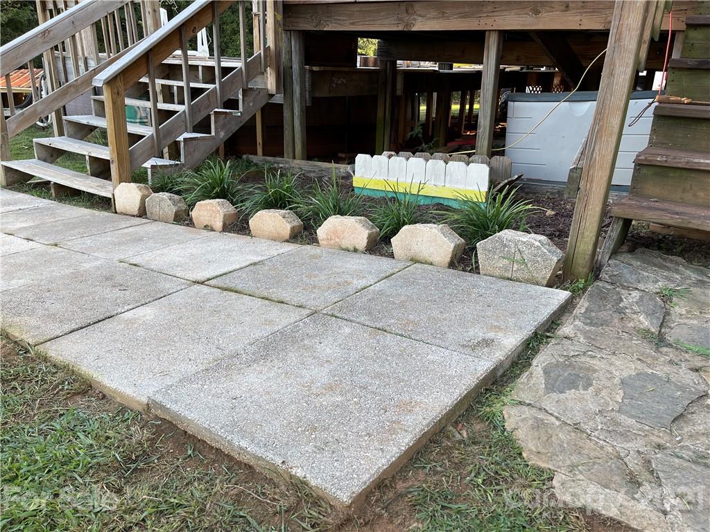 141 Allen Loop Road Rutherfordton, NC 28139 - Photo 15 of 30 a view of an chairs and tables in patio