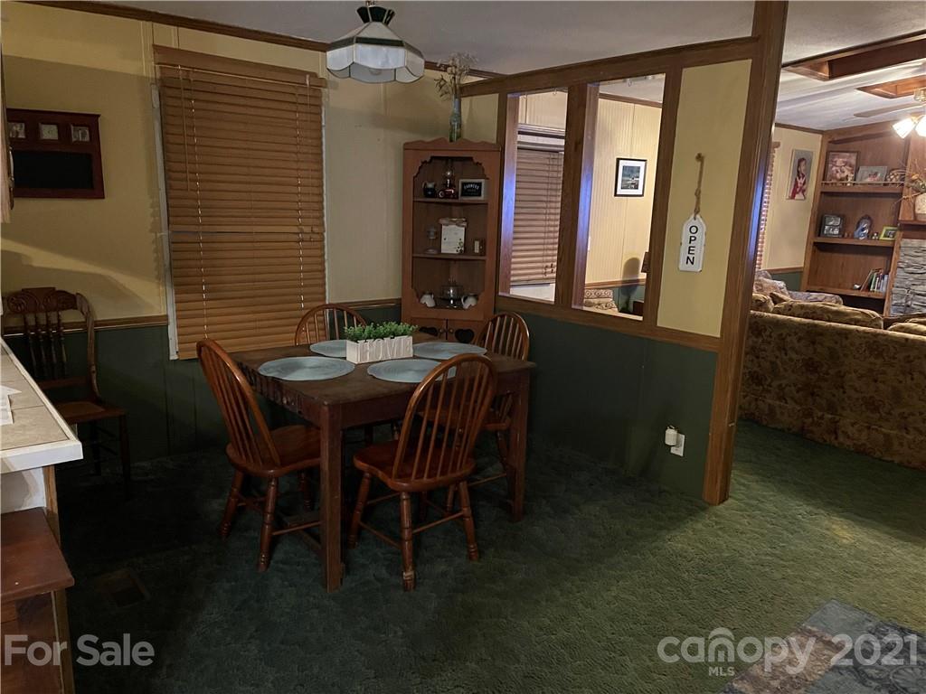 141 Allen Loop Road Rutherfordton, NC 28139 - Photo 17 of 30 a dining room with furniture and window