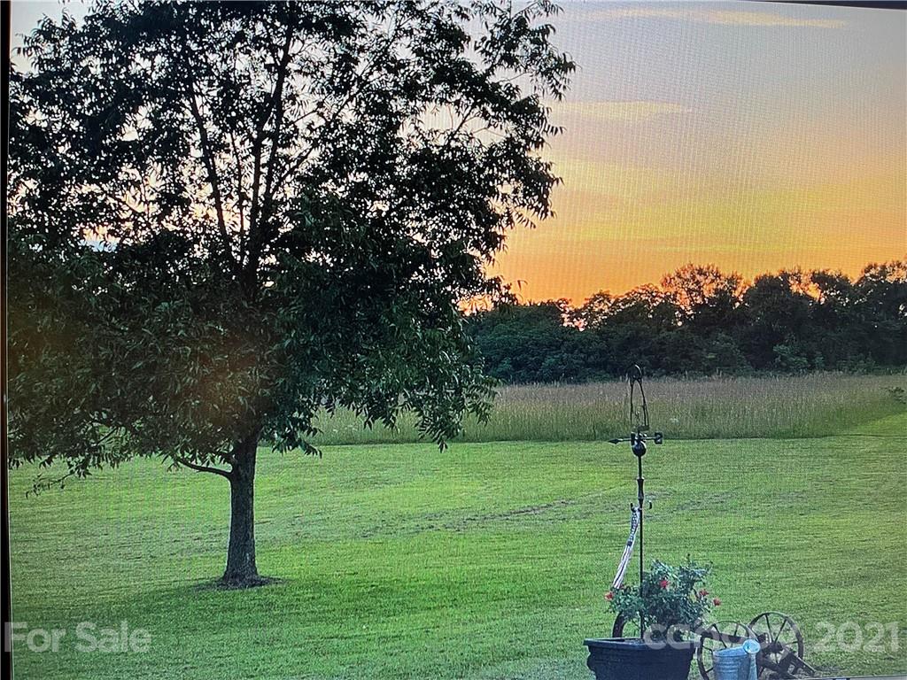 141 Allen Loop Road Rutherfordton, NC 28139 - Photo 28 of 30 a view of a golf course with a lake