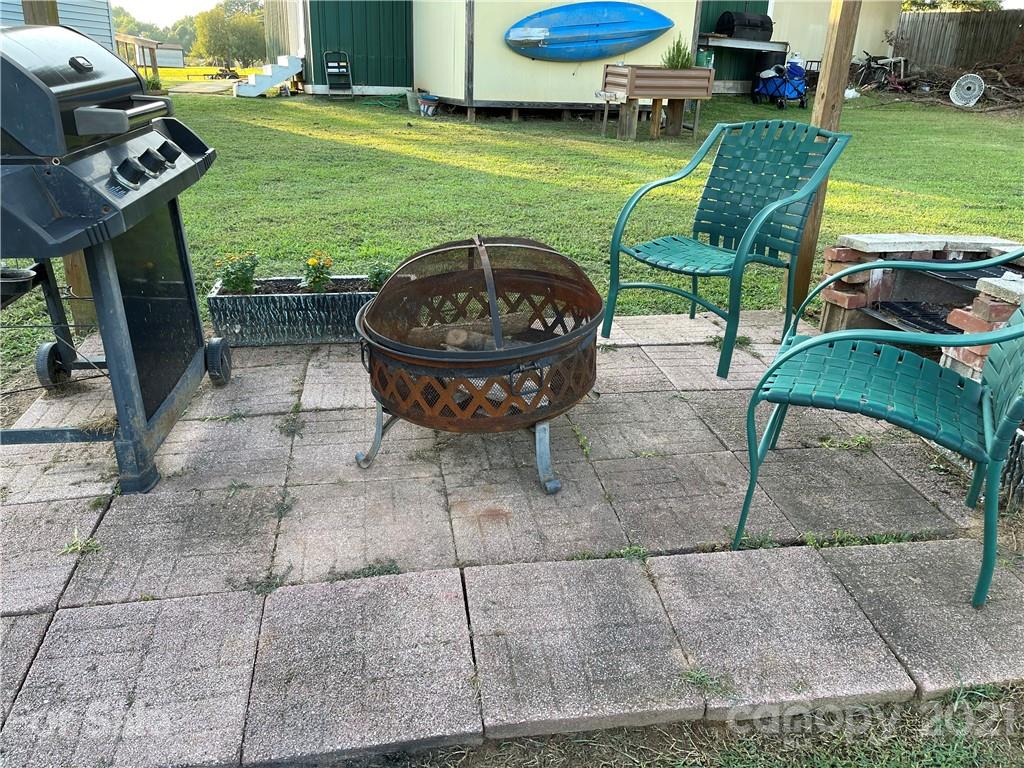 141 Allen Loop Road Rutherfordton, NC 28139 - Photo 10 of 30 a view of a table and chairs in patio
