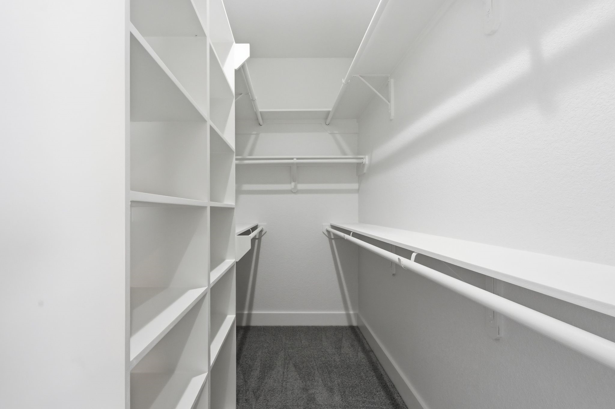 44 Meadow Lake Drive Trinity, TX 75862 - Photo 19 of 39 a view of walk in closet with empty racks