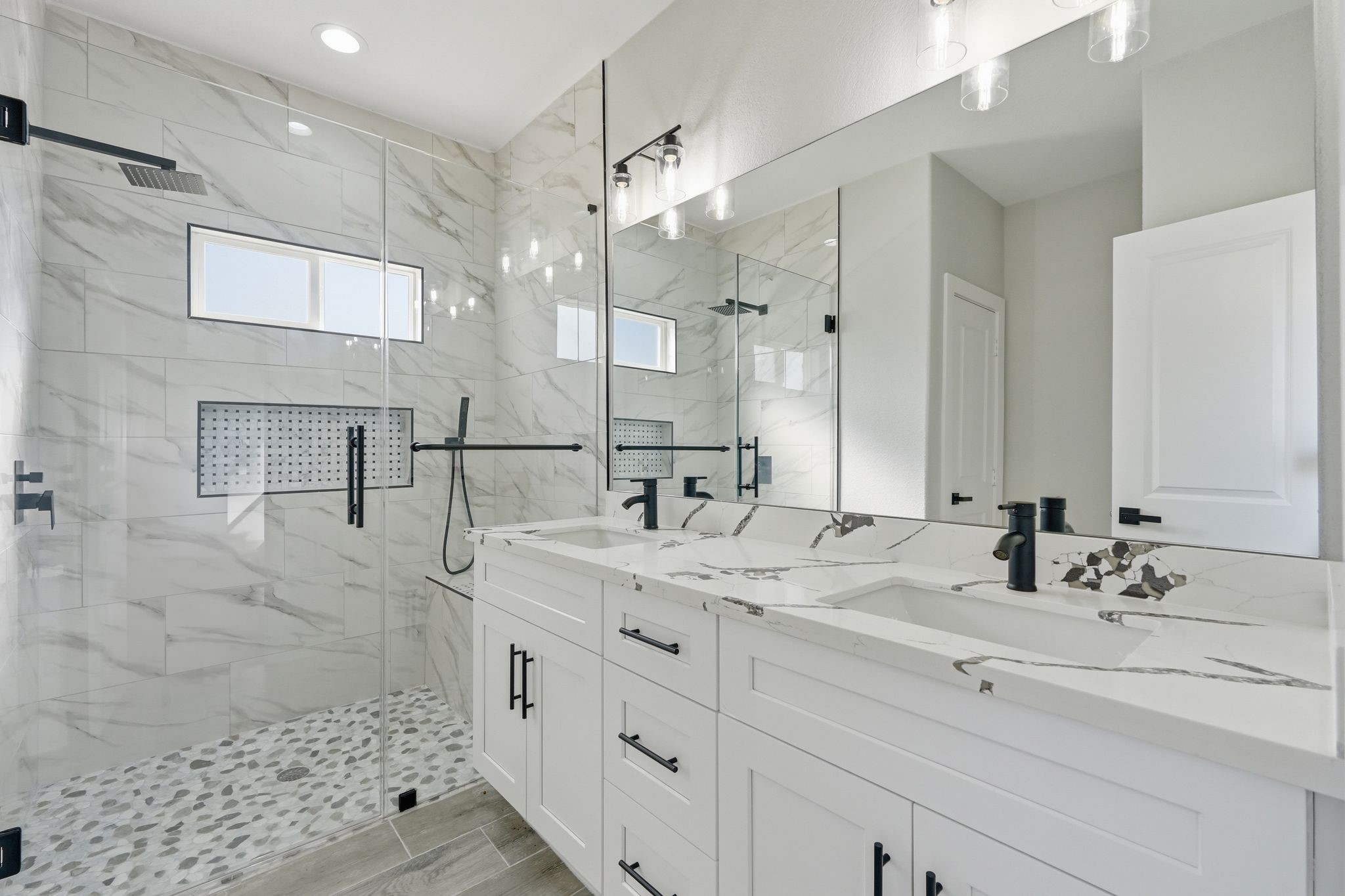 44 Meadow Lake Drive Trinity, TX 75862 - Photo 20 of 39 a bathroom with a double vanity sink mirror and shower